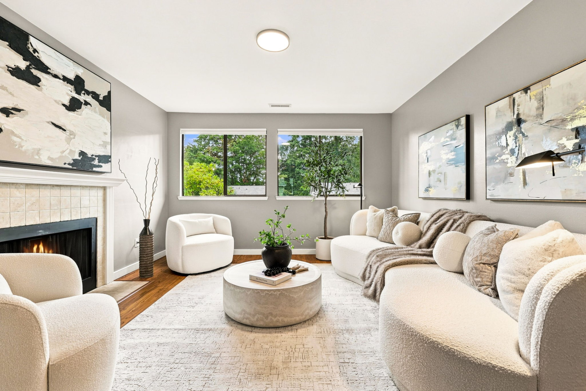 Bright living room with fireplace and natural light